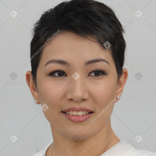 Joyful asian young-adult female with short  brown hair and brown eyes