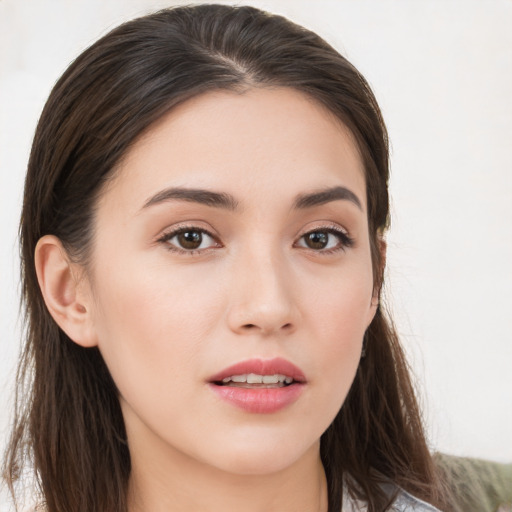 Neutral white young-adult female with long  brown hair and brown eyes