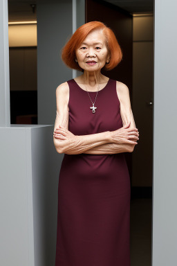 Singaporean elderly female with  ginger hair