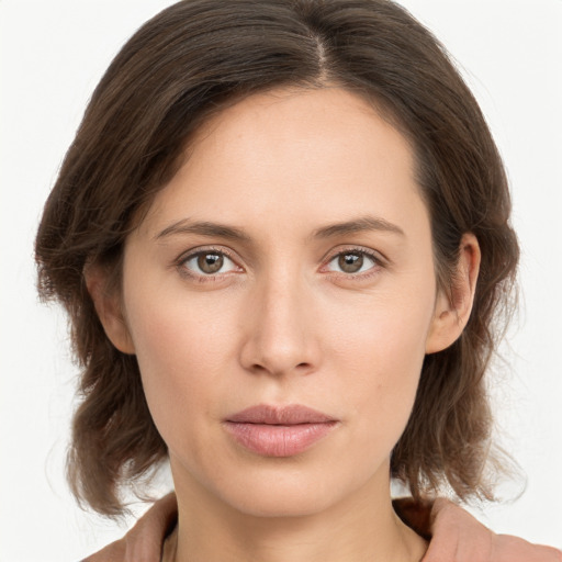 Neutral white young-adult female with medium  brown hair and brown eyes