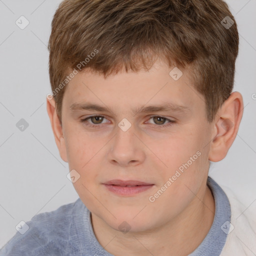 Joyful white child male with short  brown hair and brown eyes