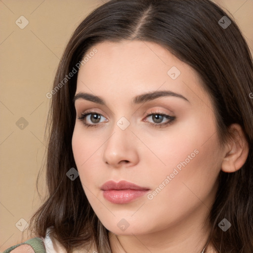 Neutral white young-adult female with long  brown hair and brown eyes