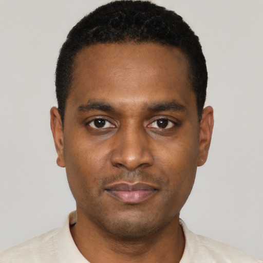 Neutral black young-adult male with short  black hair and brown eyes
