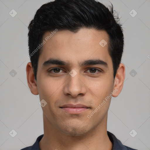 Joyful white young-adult male with short  black hair and brown eyes