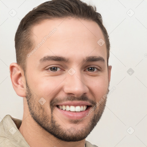 Joyful white young-adult male with short  brown hair and brown eyes