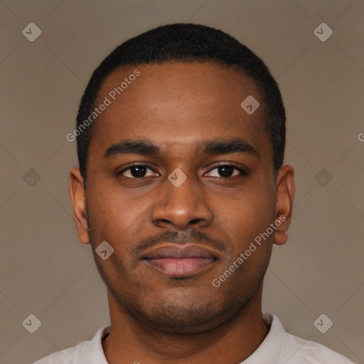 Joyful latino young-adult male with short  brown hair and brown eyes