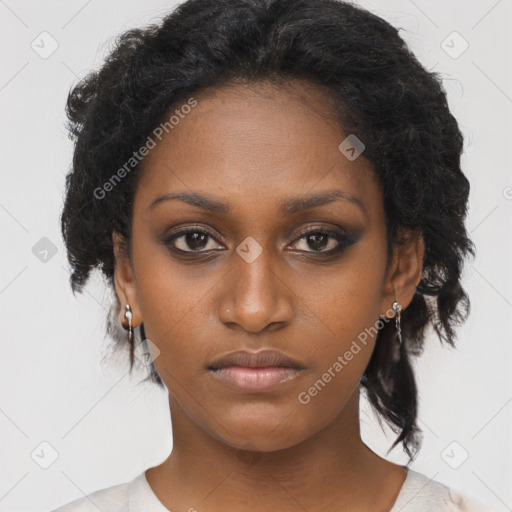 Neutral black young-adult female with medium  brown hair and brown eyes