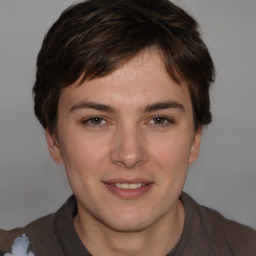 Joyful white young-adult male with medium  brown hair and brown eyes