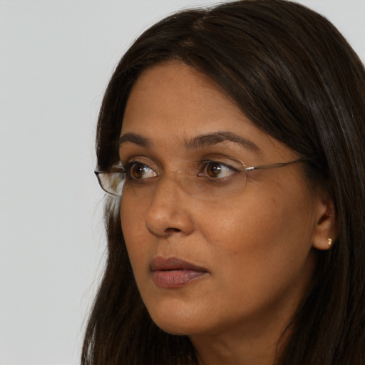 Neutral asian young-adult female with long  brown hair and brown eyes