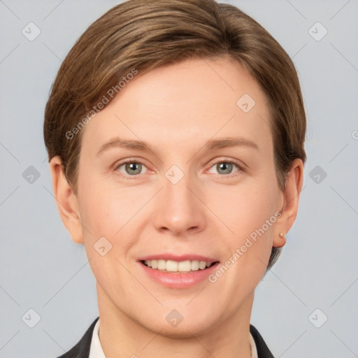 Joyful white young-adult female with short  brown hair and grey eyes