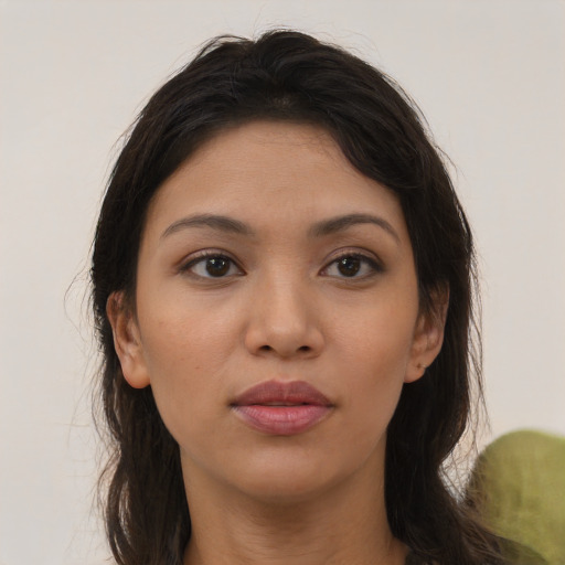 Neutral latino young-adult female with long  brown hair and brown eyes