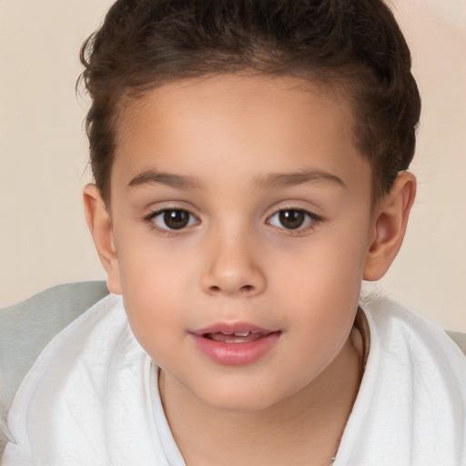 Joyful white child female with short  brown hair and brown eyes