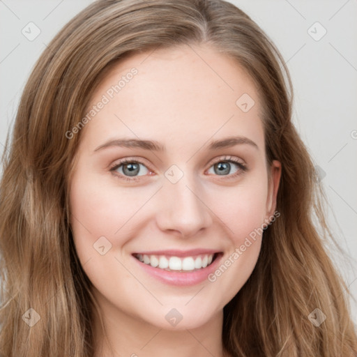 Joyful white young-adult female with long  brown hair and blue eyes