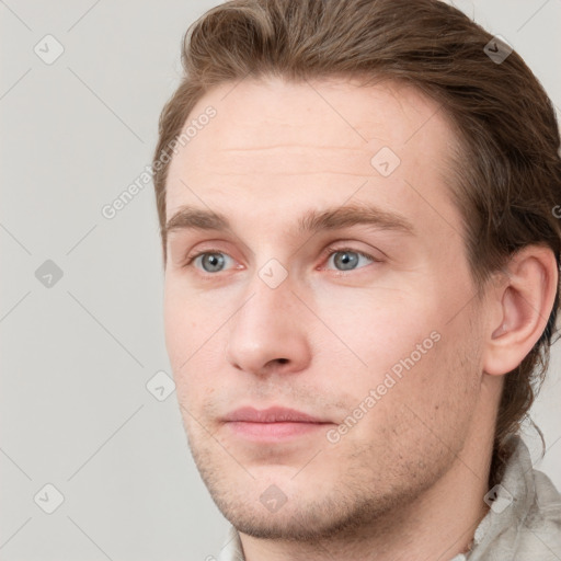 Neutral white young-adult male with short  brown hair and grey eyes