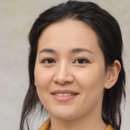 Joyful asian young-adult female with medium  brown hair and brown eyes