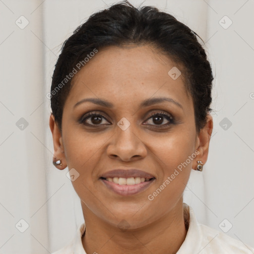 Joyful latino young-adult female with short  brown hair and brown eyes