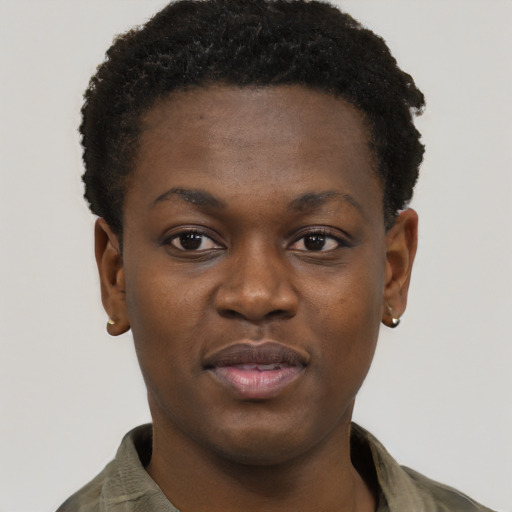 Joyful black young-adult female with short  black hair and brown eyes
