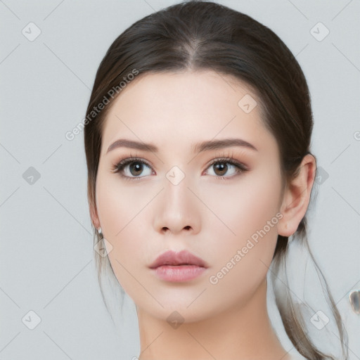 Neutral white young-adult female with medium  brown hair and brown eyes