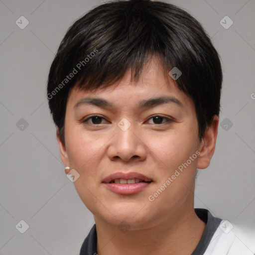 Joyful asian young-adult female with short  black hair and brown eyes