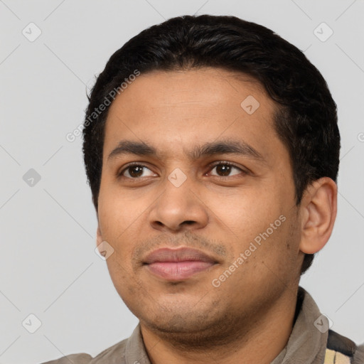 Joyful latino young-adult male with short  black hair and brown eyes
