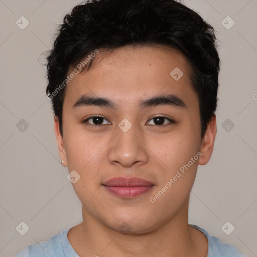 Joyful asian young-adult male with short  black hair and brown eyes