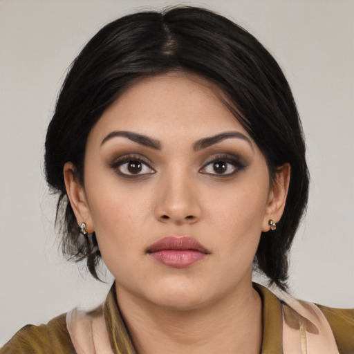 Neutral asian young-adult female with medium  black hair and brown eyes