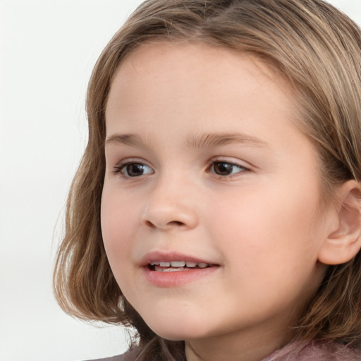 Joyful white child female with long  brown hair and grey eyes