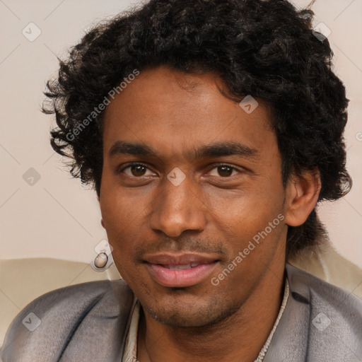 Joyful black young-adult male with short  brown hair and brown eyes