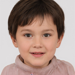 Joyful white child female with short  brown hair and brown eyes