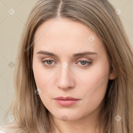 Neutral white young-adult female with long  brown hair and brown eyes