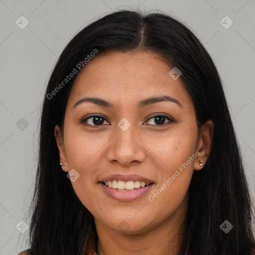 Joyful latino young-adult female with long  brown hair and brown eyes