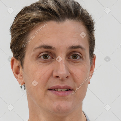 Joyful white adult female with short  brown hair and brown eyes