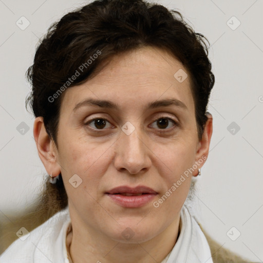 Joyful white adult female with short  brown hair and brown eyes