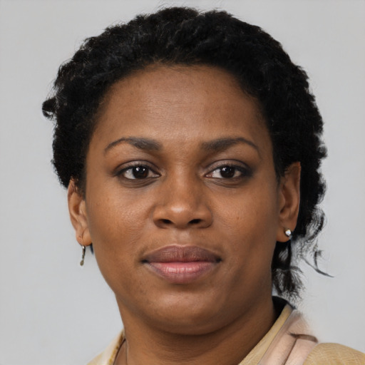 Neutral black young-adult female with short  brown hair and brown eyes
