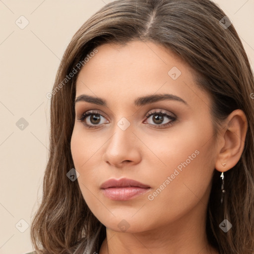 Neutral white young-adult female with long  brown hair and brown eyes