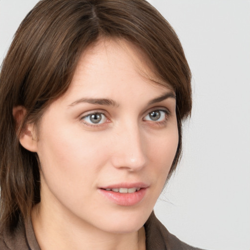 Neutral white young-adult female with medium  brown hair and grey eyes