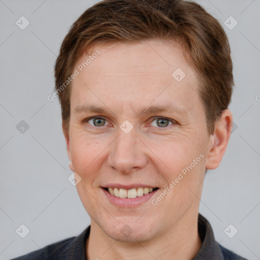 Joyful white adult female with short  brown hair and grey eyes