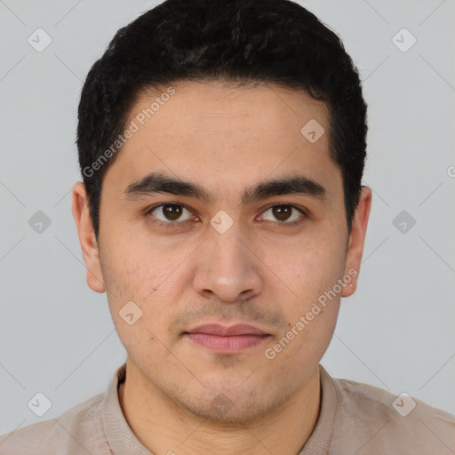 Joyful white young-adult male with short  black hair and brown eyes