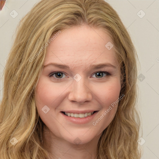 Joyful white young-adult female with long  brown hair and green eyes