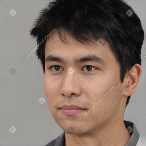 Neutral asian young-adult male with short  black hair and brown eyes