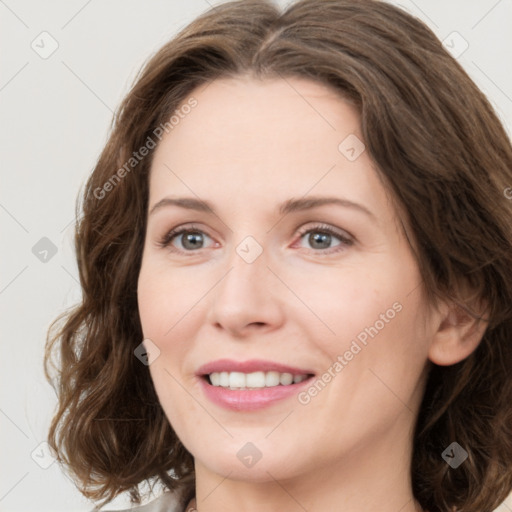 Joyful white young-adult female with medium  brown hair and green eyes