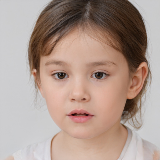 Neutral white child female with medium  brown hair and brown eyes