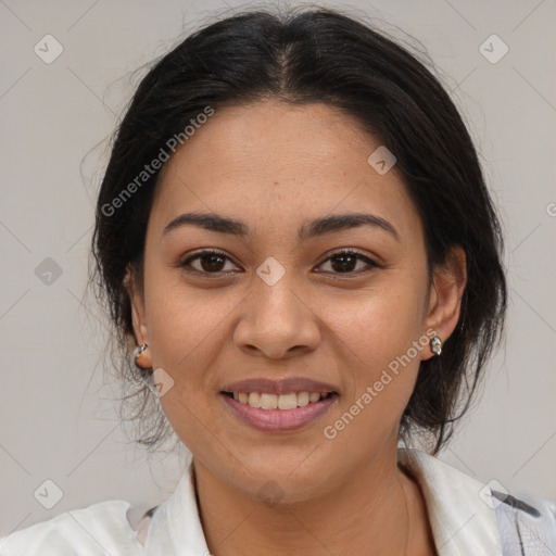 Joyful latino young-adult female with medium  brown hair and brown eyes