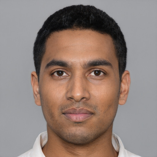 Neutral black young-adult male with short  black hair and brown eyes