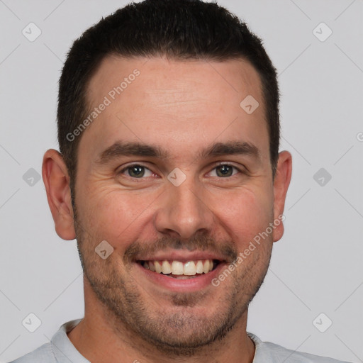 Joyful white young-adult male with short  brown hair and brown eyes