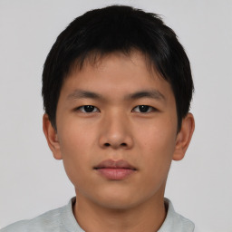 Neutral asian young-adult male with short  brown hair and brown eyes