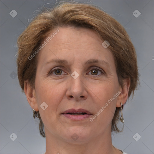 Joyful white adult female with medium  brown hair and grey eyes