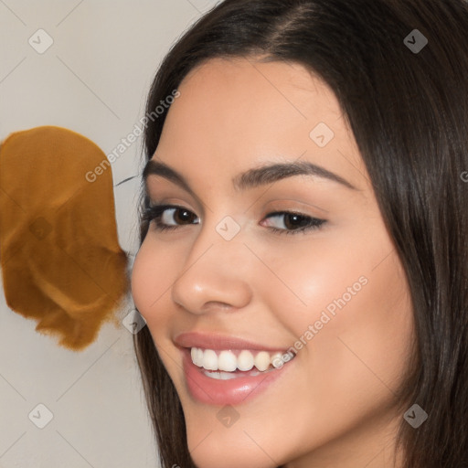 Joyful white young-adult female with long  brown hair and brown eyes