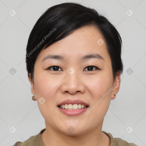 Joyful asian young-adult female with short  black hair and brown eyes