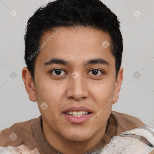 Joyful latino young-adult male with short  brown hair and brown eyes